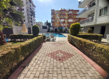 Two bedroom furnished apartment in a residence with a swimming pool, by the sea in Mahmutlar ID-7866 фото-11