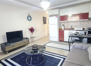 One-bedroom apartment with mountain views on one of the central streets of Mahmutlar ID-7804 фото-2