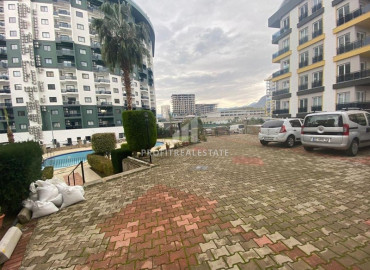 Apartment 2 + 1 with a designer interior in a residence with facilities in Mahmutlar ID-7895 фото-17