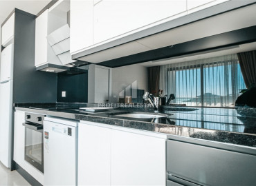 Новая дизайнерская двухкомнатная квартира на первой береговой линии в элитном комплексе Махмутлара ID-7904 фото-5