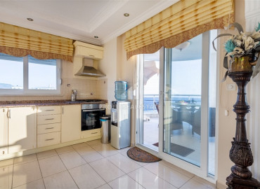 Spacious furnished duplex 2 + 1 with excellent views of the mountains and the sea on the main street of Mahmutlar ID-7906 фото-3