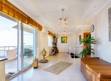 Spacious furnished duplex 2 + 1 with excellent views of the mountains and the sea on the main street of Mahmutlar ID-7906 фото-11