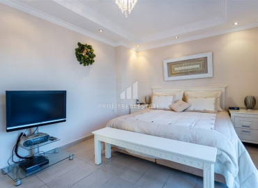 Spacious furnished duplex 2 + 1 with excellent views of the mountains and the sea on the main street of Mahmutlar ID-7906 фото-4