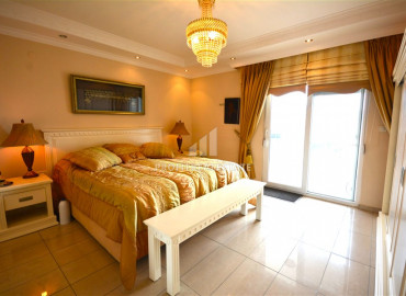 Spacious furnished duplex 2 + 1 with excellent views of the mountains and the sea on the main street of Mahmutlar ID-7906 фото-7