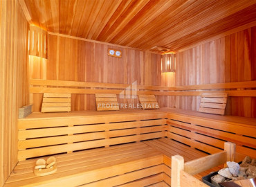 Spacious furnished duplex 2 + 1 with excellent views of the mountains and the sea on the main street of Mahmutlar ID-7906 фото-29