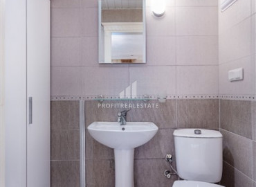 Spacious furnished duplex 2 + 1 with excellent views of the mountains and the sea on the main street of Mahmutlar ID-7906 фото-16