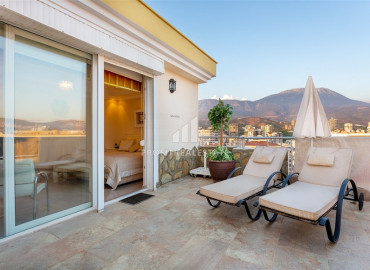 Spacious furnished duplex 2 + 1 with excellent views of the mountains and the sea on the main street of Mahmutlar ID-7906 фото-24