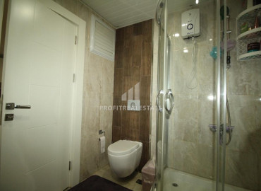Spacious furnished two-bedroom apartment 450m from the sea in the area of Mersin - Tece ID-7945 фото-9
