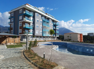 New one bedroom apartment, ready to move in, in the prestigious area of Oba, Alanya, 60 m2 ID-7975 фото-1