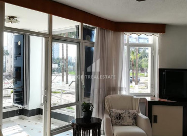 Large one bedroom apartment in a residence with a swimming pool near the sea in Davultepe, Mersin ID-7999 фото-2