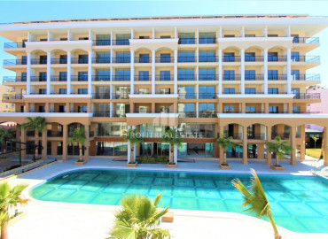 Inexpensive one bedroom apartment, in a hotel building, with access to all facilities, on the first coastline, Konakli, Alanya, 95 m2 ID-8002 фото-1