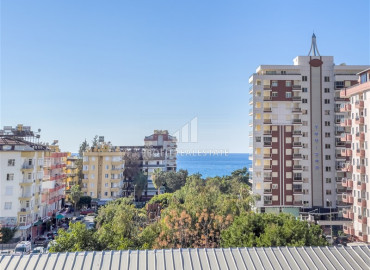 One-bedroom apartment in a new residence with a swimming pool, with a very good location in Mahmutlar ID-8005 фото-2