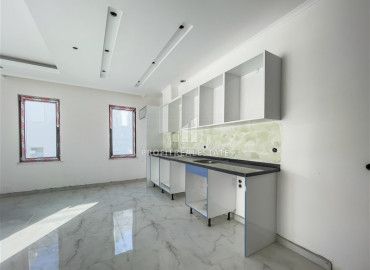 One-bedroom apartment in a new residence with a swimming pool, with a very good location in Mahmutlar ID-8005 фото-4