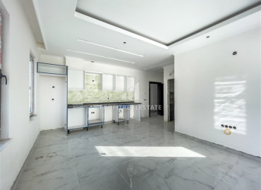 One-bedroom apartment in a new residence with a swimming pool, with a very good location in Mahmutlar ID-8005 фото-5