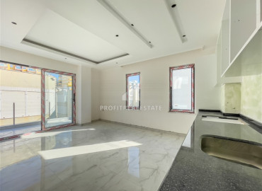 One-bedroom apartment in a new residence with a swimming pool, with a very good location in Mahmutlar ID-8005 фото-6