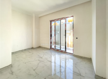 One-bedroom apartment in a new residence with a swimming pool, with a very good location in Mahmutlar ID-8005 фото-8