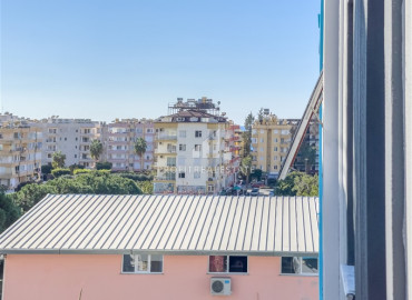 One-bedroom apartment in a new residence with a swimming pool, with a very good location in Mahmutlar ID-8005 фото-10