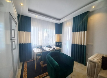 Cozy two bedroom apartment, ready to move in, just 200 meters from the beach of Mahmutlar, Alanya ID-8015 фото-3