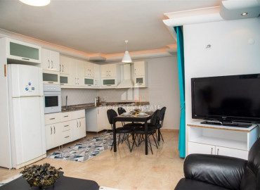 Furnished two bedroom apartment at the foot of the mountains in a residence with a swimming pool in Mahmutlar ID-8036 фото-9