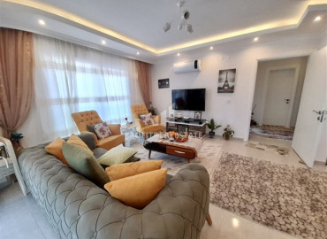 Furnished one-bedroom apartment, with mountain views, 150 meters from the center of Mahmutlar, Alanya, 70 m2 ID-8074 фото-2
