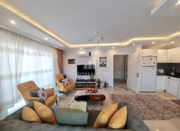 Furnished one-bedroom apartment, with mountain views, 150 meters from the center of Mahmutlar, Alanya, 70 m2 ID-8074 фото-3