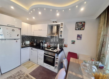 Furnished one-bedroom apartment, with mountain views, 150 meters from the center of Mahmutlar, Alanya, 70 m2 ID-8074 фото-4