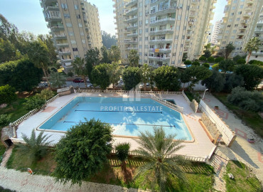Apartment 3 + 1 with a separate kitchen in a residence with facilities in the Davultepe microdistrict, Mezitli, 50m from the sea ID-8073 фото-1