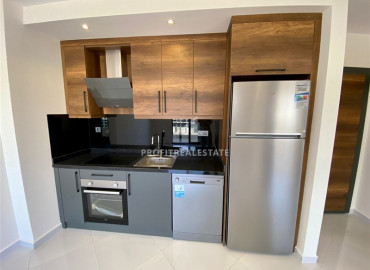 One-bedroom apartment with a view of the Taurus Mountains in a new luxury residence in Mahmutlar ID-8092 фото-2