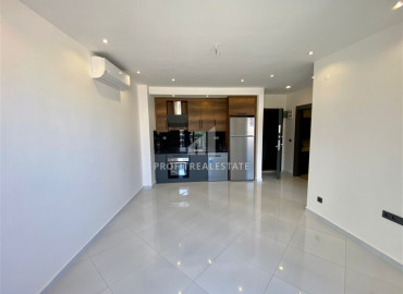 One-bedroom apartment with a view of the Taurus Mountains in a new luxury residence in Mahmutlar ID-8092 фото-3