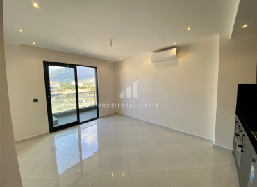 One-bedroom apartment with a view of the Taurus Mountains in a new luxury residence in Mahmutlar ID-8092 фото-6