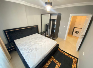 Apartment with two bedrooms and sea views on the main street of Mahmutlar, 150m from the sea ID-8100 фото-7