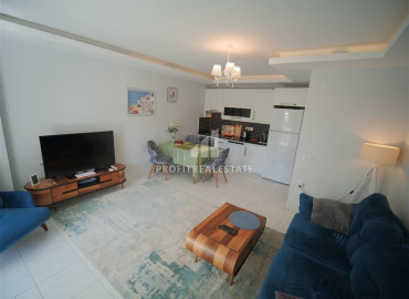 Stylish one-bedroom apartment, ready to move in, in a prestigious residential residence Mahmutlar, Alanya, 55 m2 ID-7807 фото-1