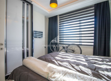 Luxurious furnished 3 + 1 apartment with sea and mountain views in the elite residence of Mahmutlar ID-8128 фото-6