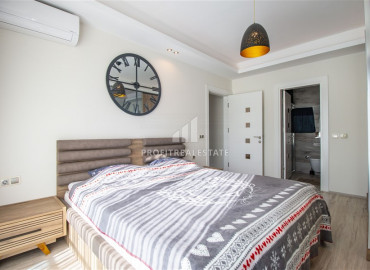 Luxurious furnished 3 + 1 apartment with sea and mountain views in the elite residence of Mahmutlar ID-8128 фото-8