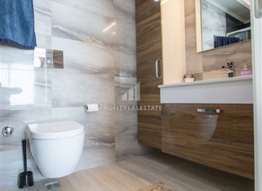 Luxurious furnished 3 + 1 apartment with sea and mountain views in the elite residence of Mahmutlar ID-8128 фото-10