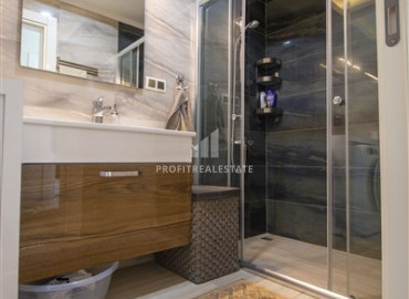 Luxurious furnished 3 + 1 apartment with sea and mountain views in the elite residence of Mahmutlar ID-8128 фото-12