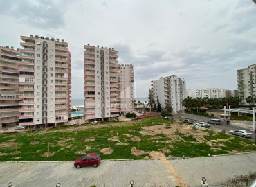 Spacious three bedroom apartment in a new residence 50m from the sea in Tej, Mersin ID-8132 фото-1