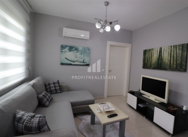 Cozy furnished apartment 1 + 1 with two balconies 300m from the sea in Oba ID-8136 фото-1