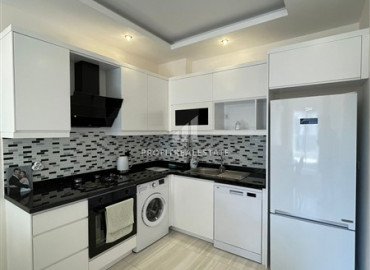 Furnished apartment 1 + 1, with an area of 65m² in a new residence in Mahmutlar ID-8144 фото-8