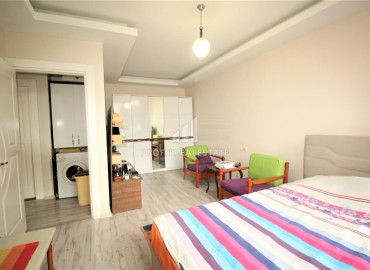 Просторная квартира с двумя спальнями, 120м² в 200м от моря в районном центре Эрдемли, Арпачбахшиш ID-8146 фото-8