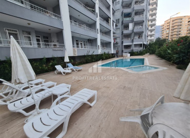 Недорогая вторичная недвижимость: трехкомнатная квартира в 250м от моря в комплексе с бассейном в Махмутларе ID-8159 фото-1