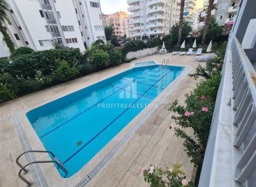 Inexpensive resale property: two bedroom apartment 250m from the sea in a residence with a swimming pool in Mahmutlar ID-8159 фото-2