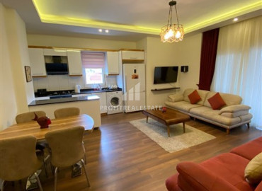 Furnished two-bedroom apartment 150 meters from the sea on the main street of Mahmutlar ID-8170 фото-1