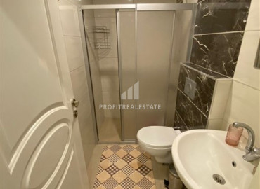 Furnished two-bedroom apartment 150 meters from the sea on the main street of Mahmutlar ID-8170 фото-7