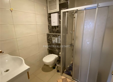 Furnished two-bedroom apartment 150 meters from the sea on the main street of Mahmutlar ID-8170 фото-9