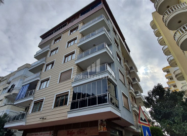 Просторная двухкомнатная квартира в центре Махмутлара в 300 метрах от моря. ID-8175 фото-1