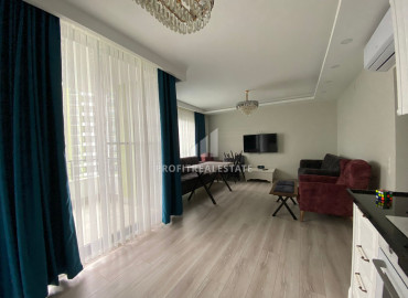 New apartment 2 + 1 in Tej, Mersin, in a gasified residence with good facilities, 200m from the sea ID-8176 фото-2