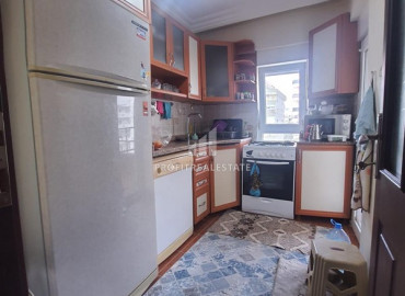 Inexpensive apartment 2 + 1 with a separate kitchen 300m from the sea, in an urban-type house in Mahmutlar ID-8178 фото-3