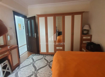 Inexpensive apartment 2 + 1 with a separate kitchen 300m from the sea, in an urban-type house in Mahmutlar ID-8178 фото-5