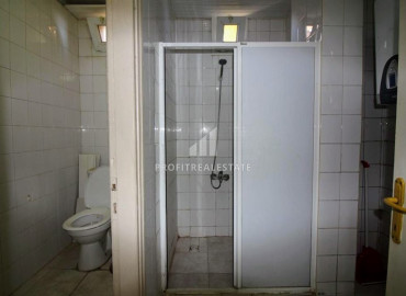 Inexpensive two-bedroom apartment 450m from the sea, in an urban-type building in Mahmutlar ID-8200 фото-5